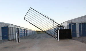 Computer-controlled gate and full perimeter fence restrict access to current customers only.